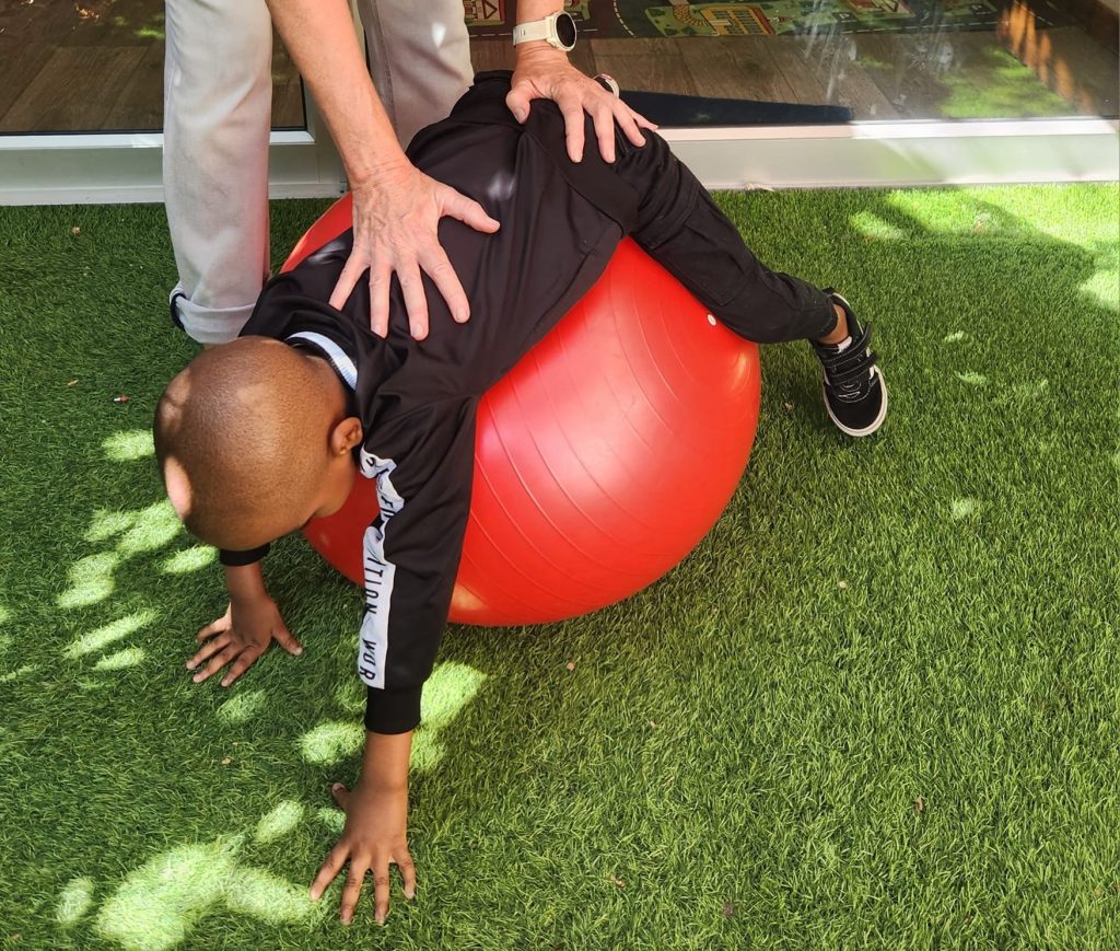 Proprioceptive Input - Mindstretch School - deep pressure stimulation with activities that let our children pull, push, lift, jump, stomp, roll, or squeeze
